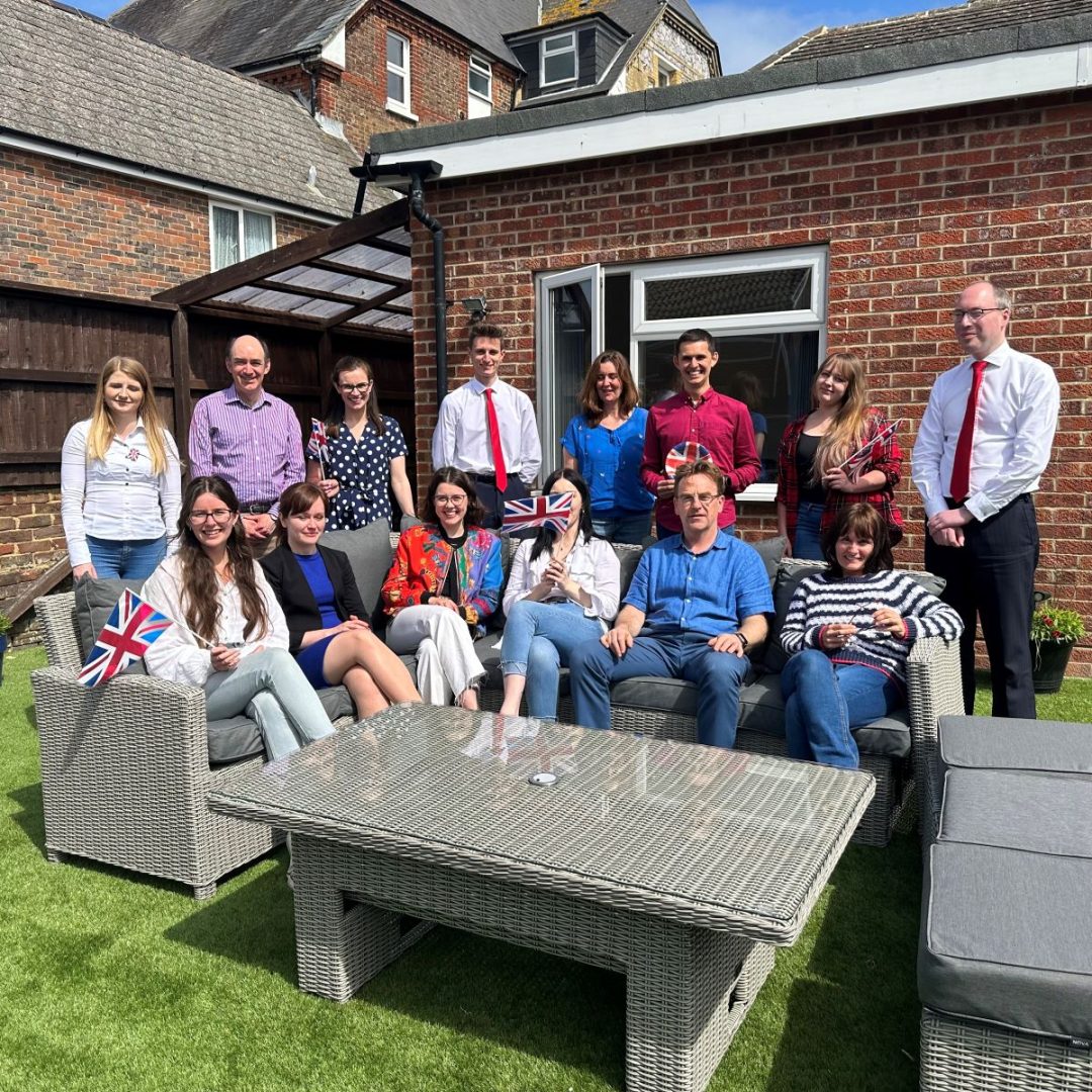 Schlich team outside in red, white and blue