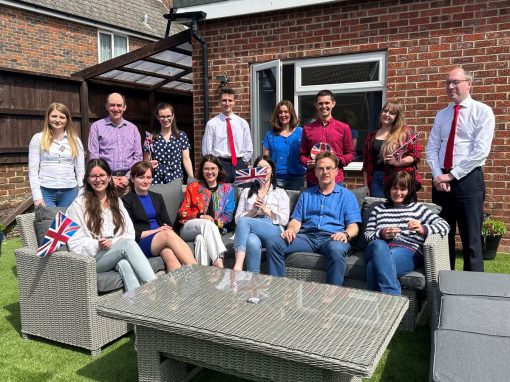 Schlich team outside in red, white and blue