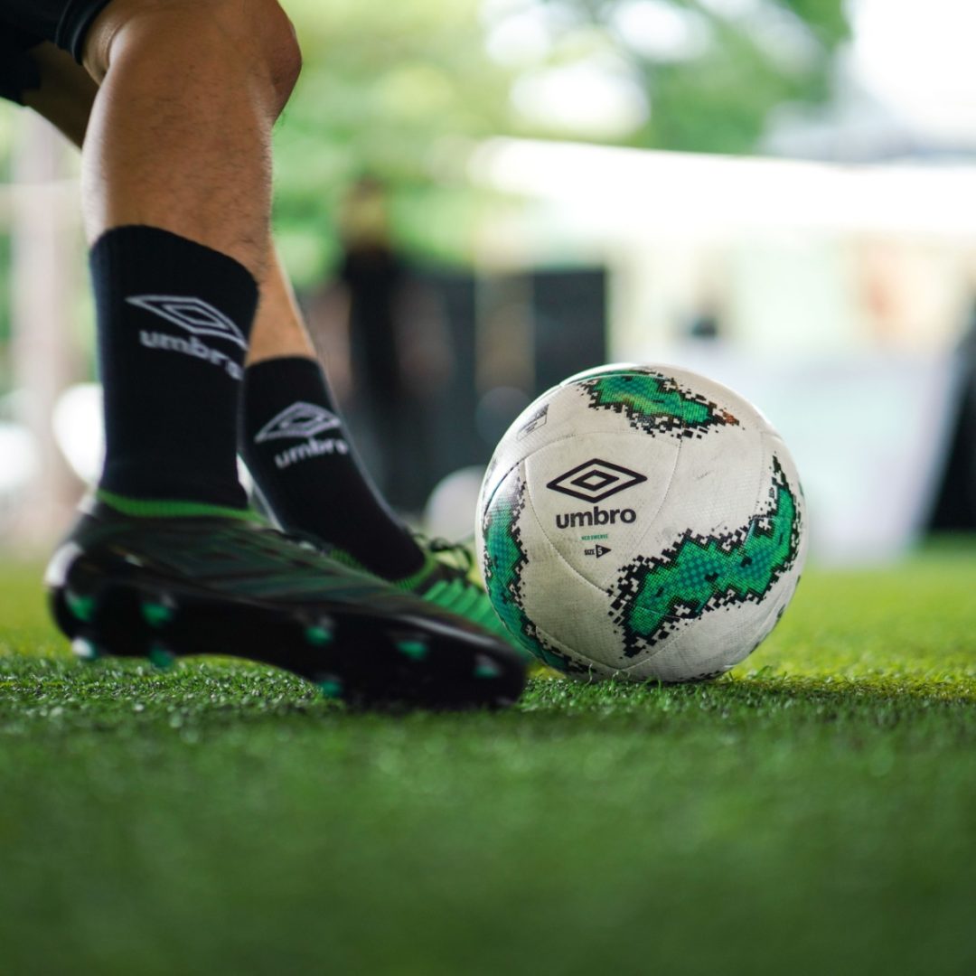 football being kicked
